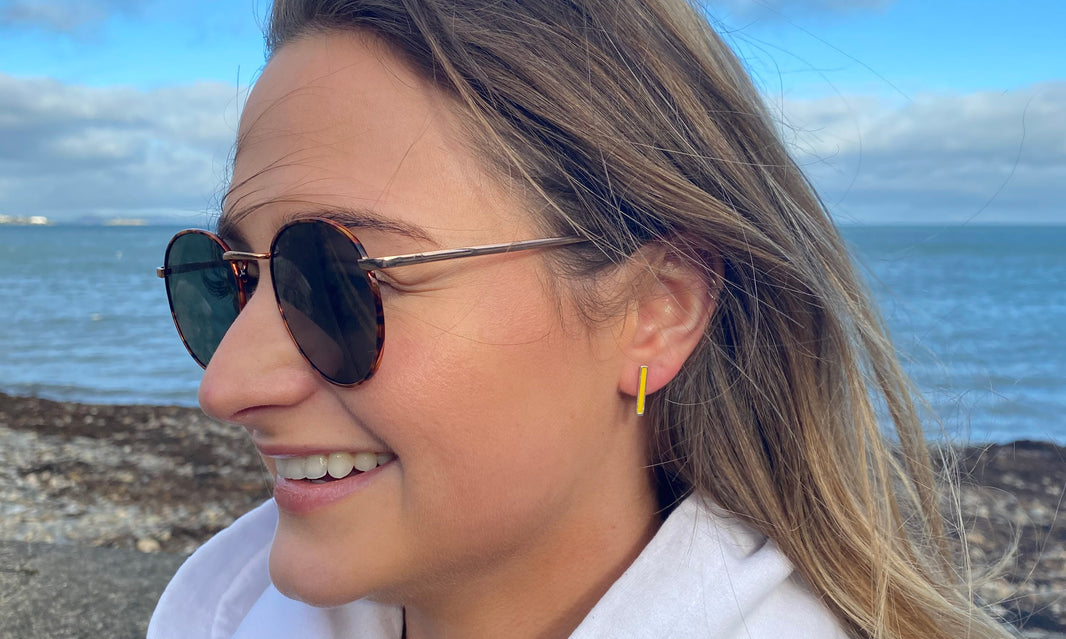 Above: Our yellow Success stud earrings