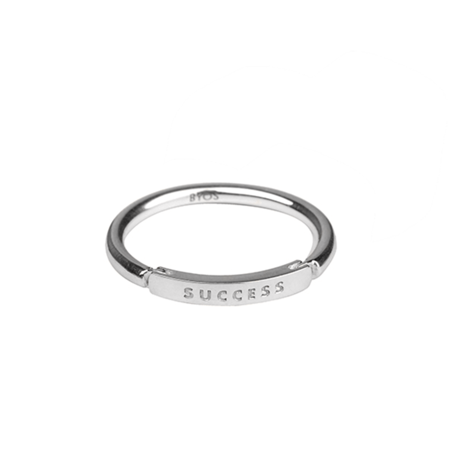 Minimalist silver affirmation ring engraved with the word "SUCCESS" – Bar of Strength by Melissa Curry- front-view